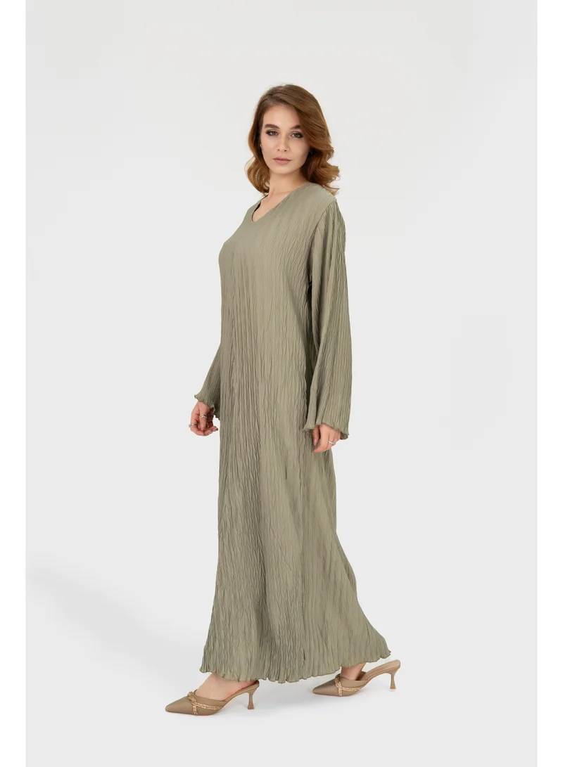 اوفيليا فستان نسائي مطوي - فستان ماكسي بلون الفستق بقماش انسيابي مناسب للإطلالات الكاجوال والمناسبات